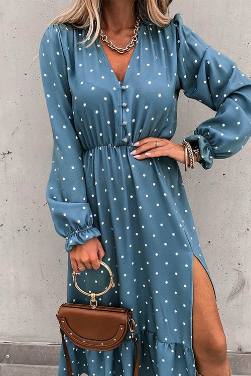Women's Jade polka dot midi dress featuring a high slit and ruffled details, perfect for elegant summer occasions.