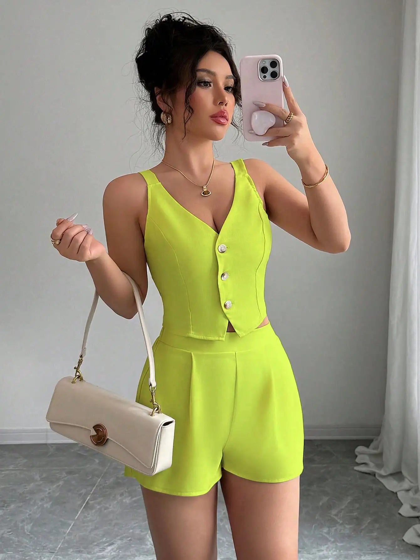 Spur & Silk women's two-piece set with apricot casual top featuring front buttons and slit hem, paired with matching shorts.