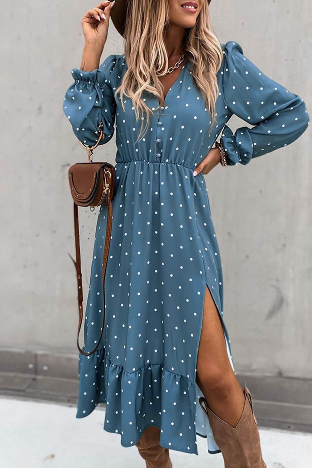 Women's Jade polka dot midi dress with high slit and ruffled details, featuring buttons and a stylish high neckline.