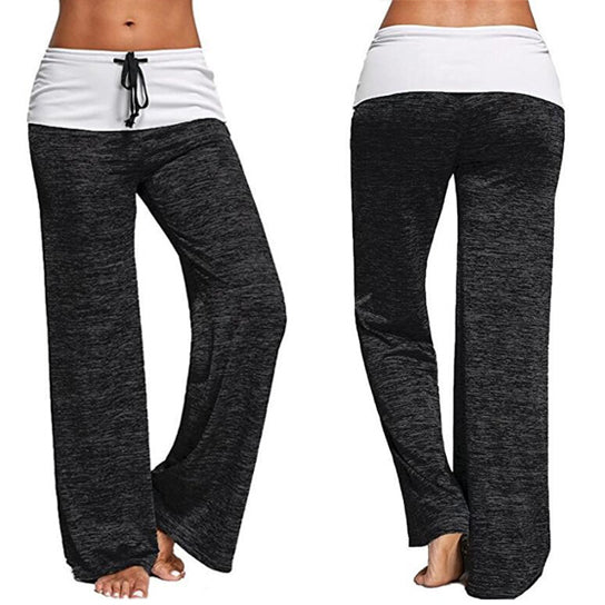 Women's black wide-leg yoga pants with white fold-over waistband and front drawstring