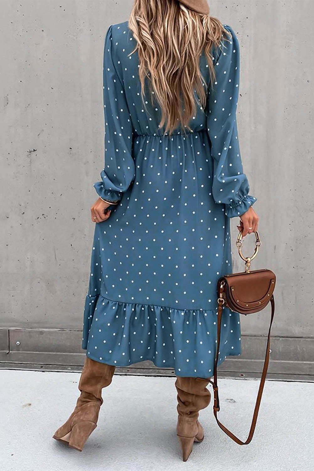 Jade women's polka dot midi dress with high slit and ruffled hem, featuring button details and a stylish, flowing design.