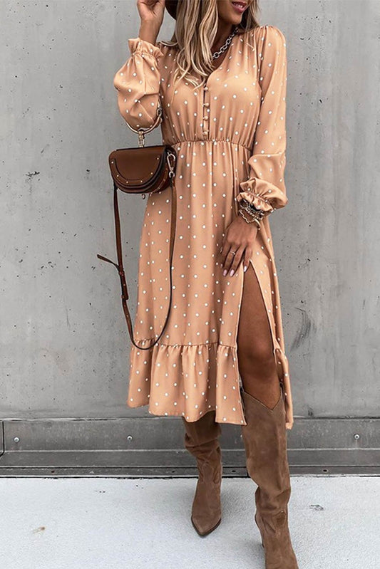 Jade women's polka dot midi dress with high slit and ruffled details, featuring button accents and a stylish high neckline.