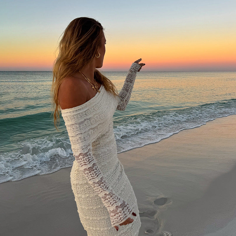 Elegant off-shoulder lace maxi dress by Carmine Juneberry, featuring a socialite style with flowing fabric and intricate lace details.
