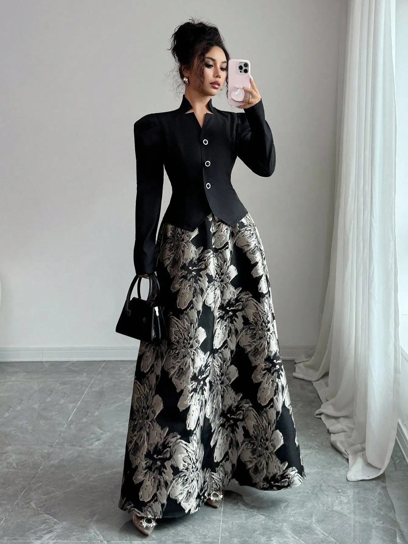 Black blazer with puff sleeves and floral A-line skirt set for women, stylish office to evening wear by Spur & Silk.