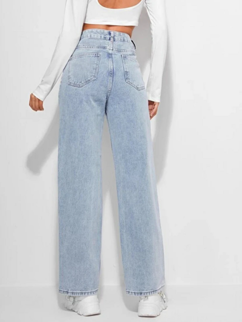 Light blue women's high rise denim jeans from Ochre Ourea in size 28, displayed on a hanger with front and back views.