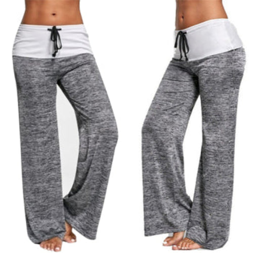 Women’s wide leg gray yoga pants with fold-over drawstring waistband, modeled standing